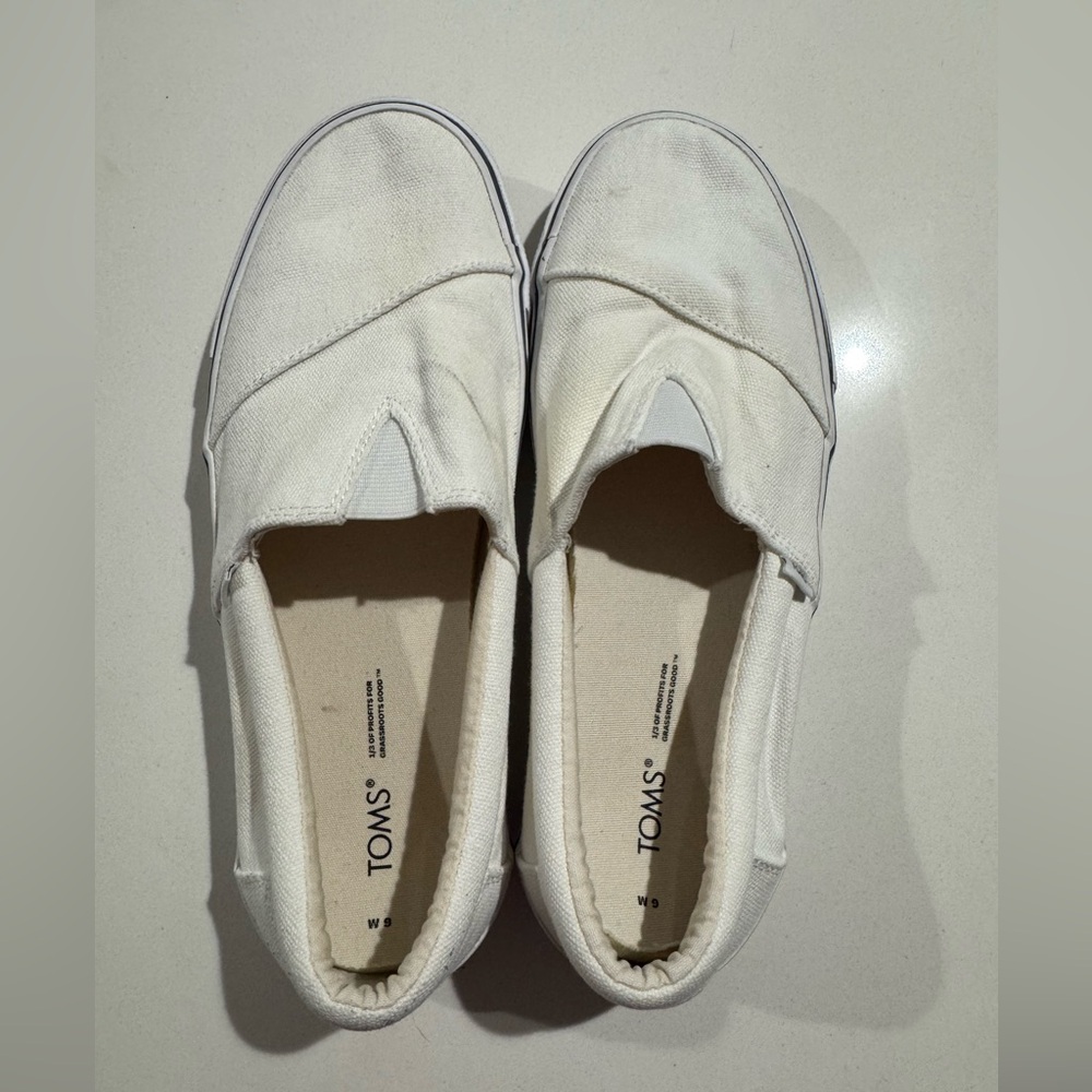 Tom’s Women’s Slip On White Canvas Shoes 9